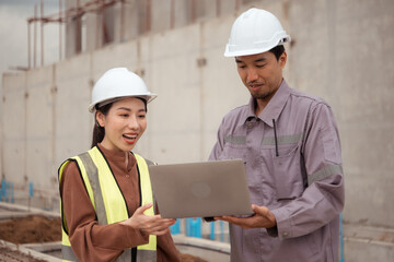 Engineers and architecture inspect and supervise the construction of building walls and foundations of residential buildings