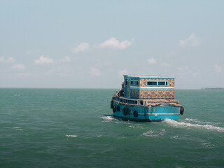 Colorful Boat Sailing Near Jaffna, Sri Lanka &ndash; Tranquil Coastal Scene
