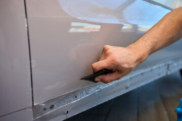 Applying a Protective Film on the Surface of Your Car for Enhanced Durability and Shine
