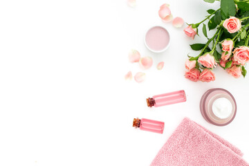 Skin care cosmetic products with roses essential oil. Beauty routine concept
