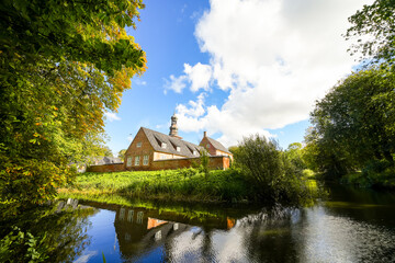 View of the castle near Husum, near the town of Husum in the North Frisia district. Husum Castle with the surrounding landscape.  © Elly Miller