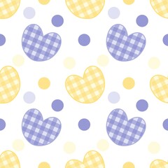 Sweet seamless pattern featuring checkered hearts in pastel yellow and blue with scattered polka dots on a white background. Perfect for baby or cute designs.