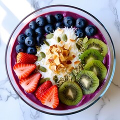 Acai bowl topped with rainbow arranged fruits and seeds presented in dynamic health inspired styling for a vibrant nutritious dessert concept
