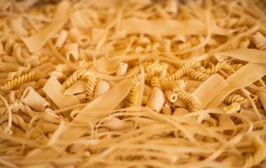 composition of raw Italian Spaghetti and pasta Different shapes.