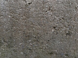 Rough Grey Concrete Surface with Cracks and Small Inclusions