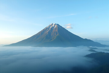 Fototapeta premium Serene mountain peak majestically pierces through a sea of ethereal fog, capturing the tranquil beauty and grandeur of nature's stunning landscape