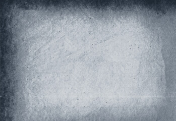 Gray concrete wall background texture showing rough surface with dark vignette border