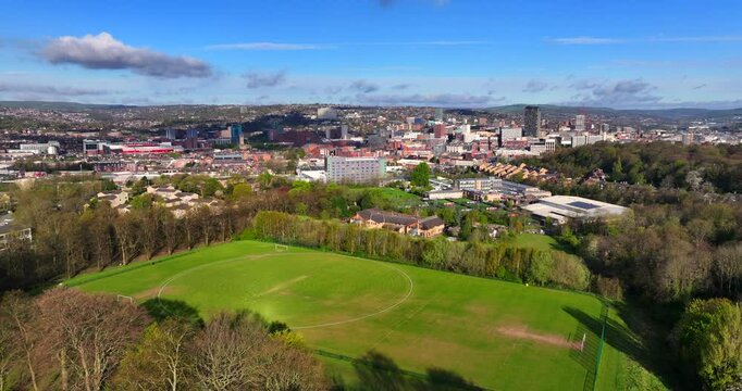 Aerial video of Sheffield skyline from the vantage point of Norfolk heritage park on a Spring day