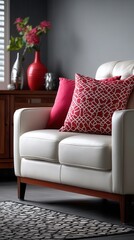 Elegant white armchair with red accent pillows in modern living room