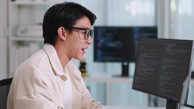 Tired programmer suffering stress and burnout while working at office on software development task