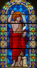 Fototapeta premium Stained glass (1939) of Jesus as Agnus Dei or Lamb of God.