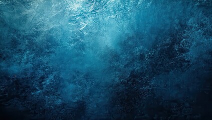 Deep blue textured surface, suggestive of ice or frost, with a slightly hazy, uneven pattern