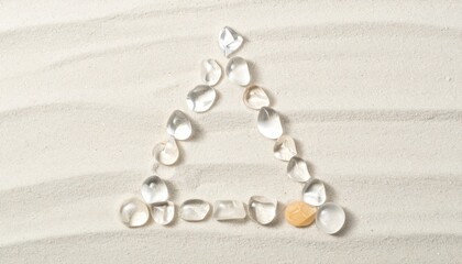 Creating artistic sand patterns with pebbles beach photography natural setting aerial view creativity