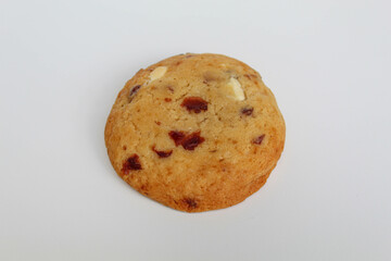 White choco soft cookie with almond and berry cuts, isolated on white background