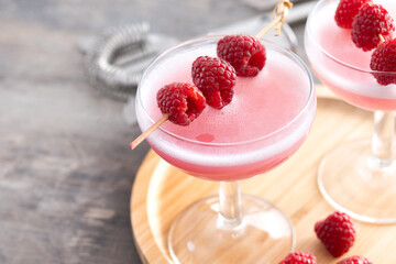 Elegant French Martini Cocktail on wooden table. Copy space