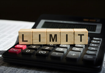 Limit concept financial budget calculator wooden blocks business finance calculation accounting deadline