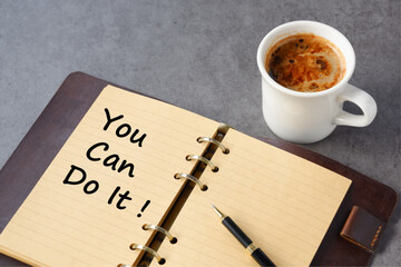 You Can Do it ! - Written words you can do it on paper notebook with cup of coffee and pen, life and business motivational inspirational concept
