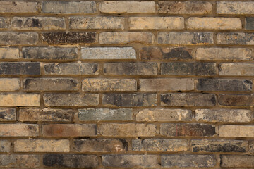 Textured brick background in daylight
