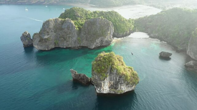Aerial view of Nui beach and rocky coast, Ko Phi Phi Don island, Krabi province, Thailand