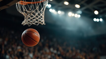 Fototapeta premium Basketball swishing through a hoop