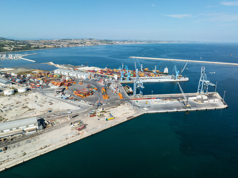 Aerial view of the busy commercial port and coastline in Italy