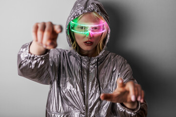 Woman in LED Glasses and Metallic Jacket