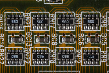 Close-Up of Electronic Components on a Circuit Board with Detailed Layout