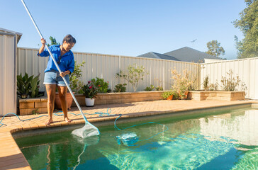 Woman Maintaining a Pool in an Australian Backyard