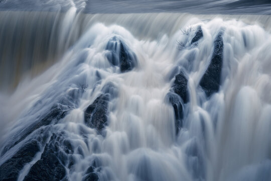 Ethereal long exposure shot of Villar Dam waters in Madrid
