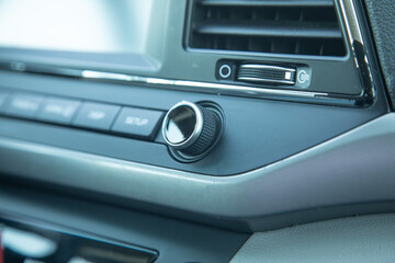 Close up view of modern car buttons. Technology system control