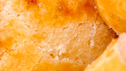 Detailed Surface of Baked Pastry Revealing Texture and Golden Brown Color