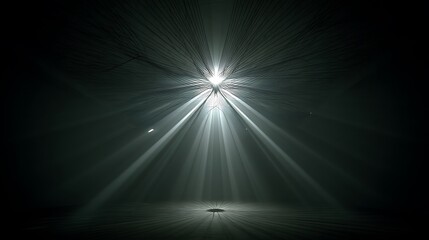 Obraz premium A bright light beams down from a mass of strings in a dark space.