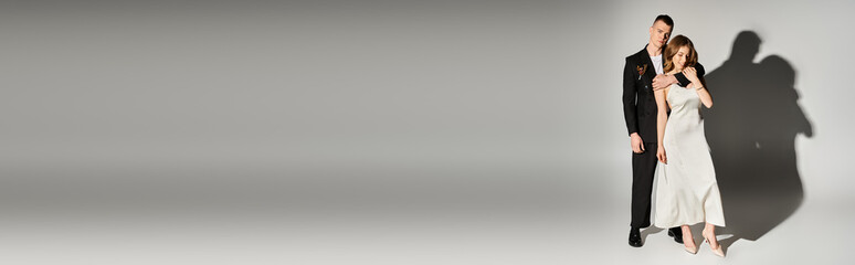 Celebrating love with an elegant couple dressed for nuptials in a romantic moment