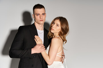 Elegant couple captures the essence of romance in a timeless wedding portrait