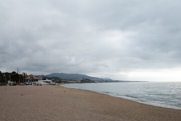 View of the Badalona beach on a cloudy day