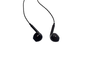 Close up of black wired headphones isolated on white background. Modern gadgets for communication