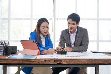Business Colleagues Analyzing Financial Data Together