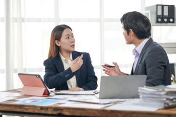 Business Professionals Discussing Strategy in Office