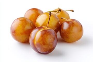 Obraz premium Close-up of ripe plums, showcasing their warm, amber hues and smooth skin.