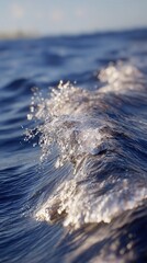 Ocean waves glistening sunlight
