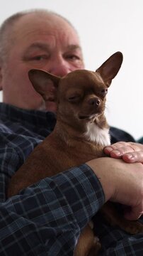 An old man and his dog. 