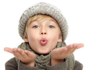 Child blowing kiss while wearing cozy winter hat and scarf, surrounded by playful atmosphere. expression is joyful and inviting, capturing essence of winter fun