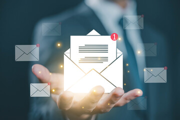 hand show newsletter notification and open mail. concept of correspondence, and news for campaign...