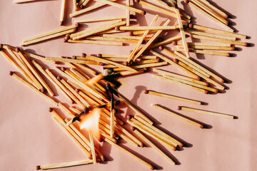 Conceptual image series using matches — new, burned, and burning — to represent stages of burnout, emotional fatigue, and mental exhaustion