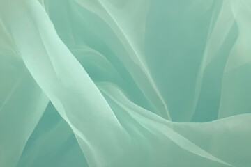 Obraz premium Different types of fabrics showcasing a translucent mint green textile with soft draping and flowing textures during daylight