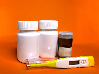 medicine bottle and pills