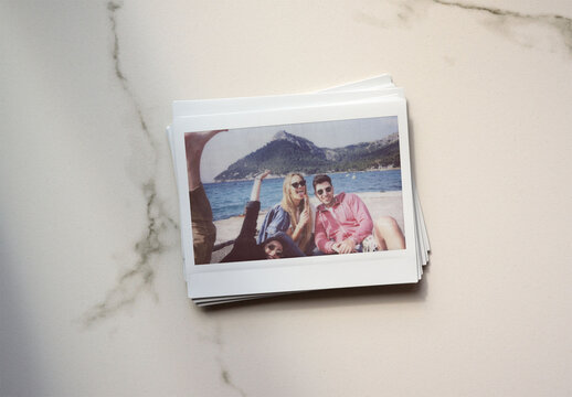 Blank Polaroid Mockup on Marble Surface