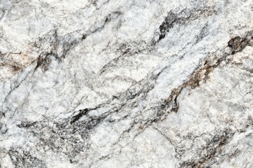Close-up view of textured stone surface, displaying intricate patterns of white, gray, and brown hues, with veins and fissures running through it