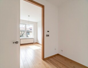 Empty Room Interior with Light Wooden Floor and Open Doorway View