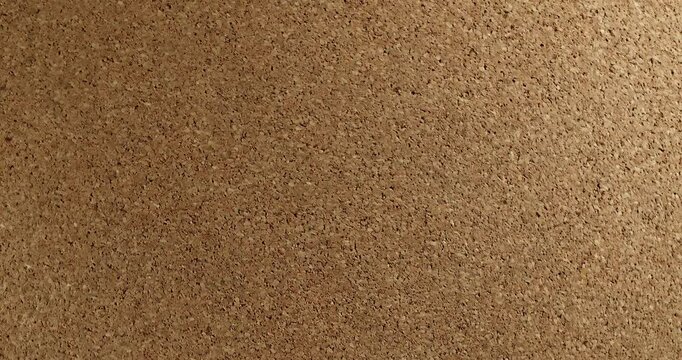 Cork Texture Drift with Natural Flow. Video capturing the gentle motion of a rustic cork surface, ideal for cozy and organic design visuals.	